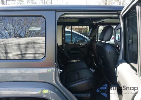 2023 Jeep Wrangler 4Xe Sahara 4X4 from USA, damaged, VIN 1C4JJXP61PW519697